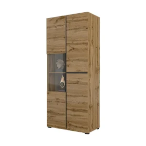 Hoge vitrinekast met 2 deuren uit de HAVANA collectie. Kleur eiken en zwart. Hoge vitrinekast met 2 deuren uit de HAVANA collectie. Kleur eiken en zwart.